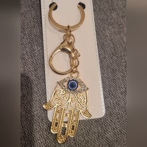 Keychain of the hand of Fatima and a Turkish eye in the center